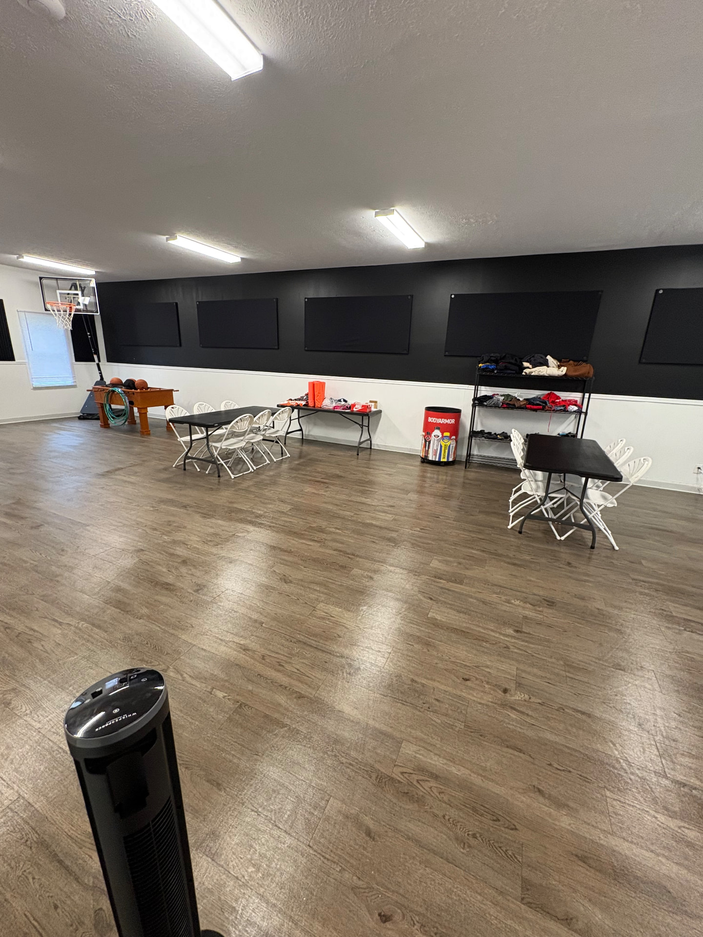 Freshly cleaned community room with tables and chairs in Akron, Ohio